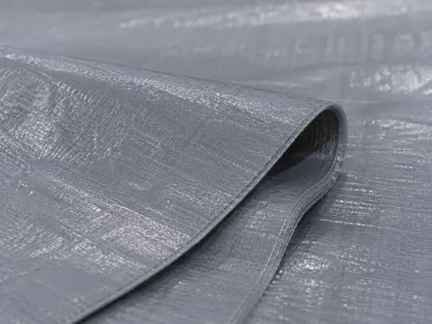 Reinforced woven construction cover fabric texture for temporary outdoor use
