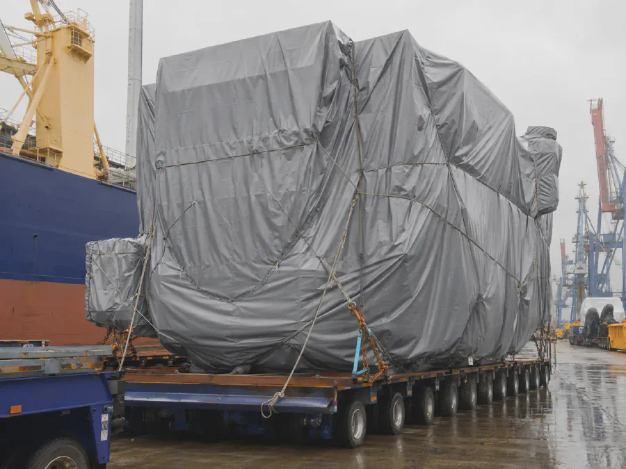 Heavy-duty tarpaulin cover for transformer marine cargo protection