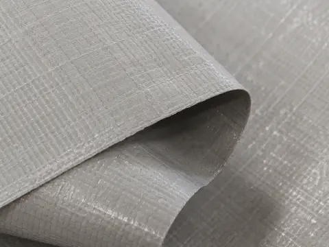 Close-up woven texture detail of industrial packaging fabric