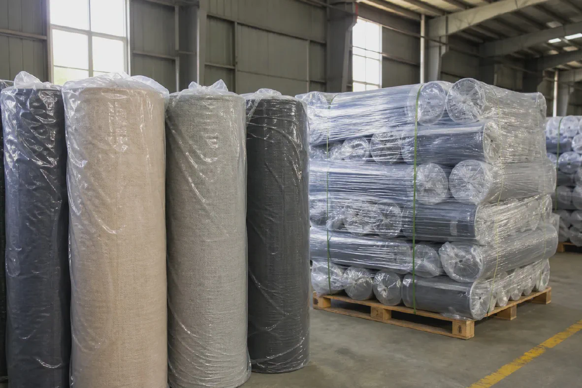 Individually wrapped and palletized woven fabric rolls