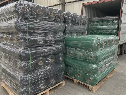Black UV ground cover rolls packed on pallets for export shipment