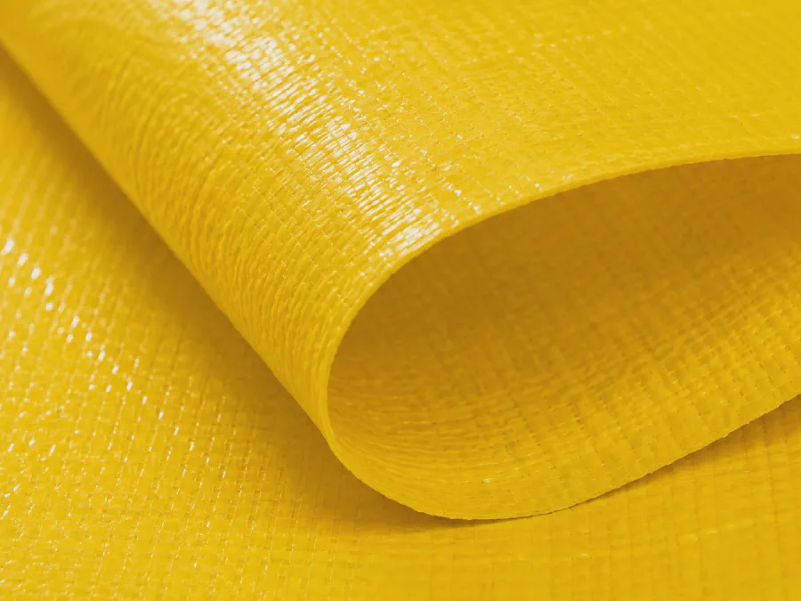 Yellow laminated PP woven fabric texture detail for construction cover rolls